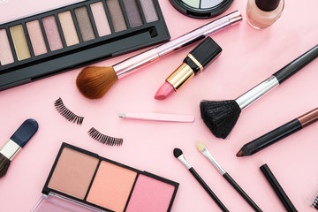 Make up cosmetics products against pink color background