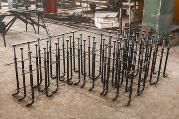 Metal anchor bolts for concrete structures, foundation on the background of the reinforcing...