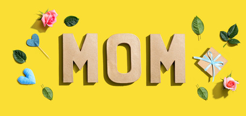 Mothers day theme with pink roses and small gift box - flatlay