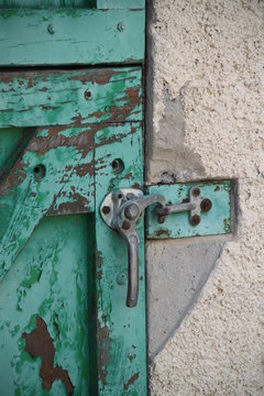 Green rusty horse stables doors