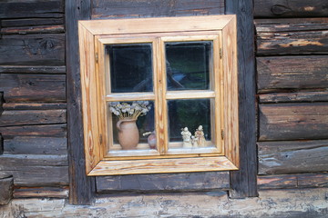 Window in Log cabin house in Nizna Boca village and municipality in Liptovsky Mikulas district, central Slovakia