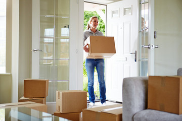Young woman moving to a new house