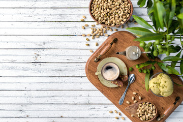 Coffee cup, snacks and dessert on white wooden background with copy space, 3d rendering 