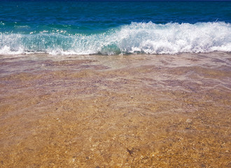 yellow sand on the coast of Alanya in Turkey. Cleopatra beach
