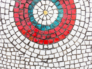 Mosaic wall decoration with white and red  elements. Urban architecture, decorative ornaments.