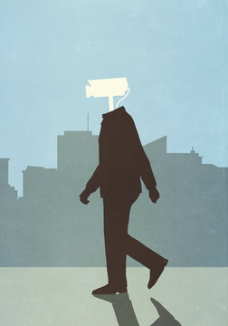 Man with surveillance camera for head