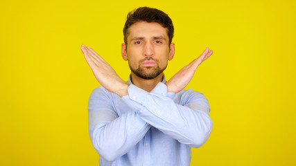 Stop concept: virus, violence, abortion, corruption, inequality, plastic. Bearded man in light blue...