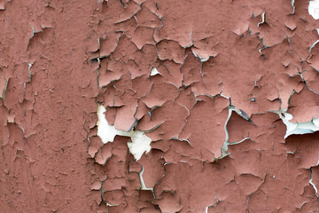 The brown paint cracked from time to time. The metal surface was painted with a paint. The paint...