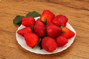 Ripe sweet strawberry with leaf