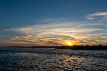 Sunset at Guarairas lagoon, Tibau do Sul, near Pipa beach and Natal, Rio Grande do Norte, Brazil on April 19, 2015