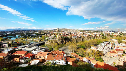 Fototapeta na wymiar TBILISI, GEORGIA APRIL 19, 2020: Beautiful aerial view of the old part of city in Tbilisi, Georgia