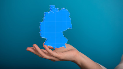 3D map of Germany. Map of Germany land border with flag. Germany map on white background. 3d rendering.
