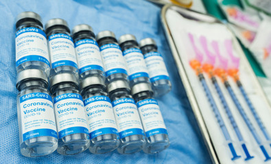 Coronavirus covid-19 experimental vaccine in a laboratory, conceptual image