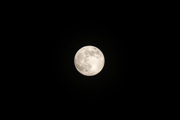 Full moon on dark sky.