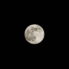Full moon on dark sky.