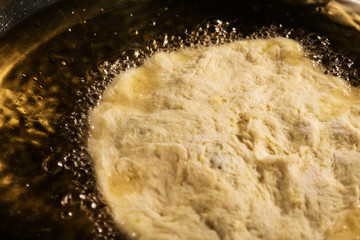 Scone baking in many cooking oil and in metal chrome pan