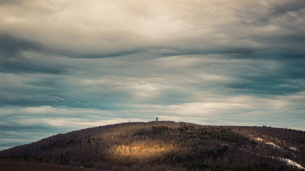 Fototapeta na wymiar Sunlight on Mount Wachusett in Massachusetts
