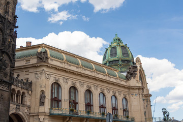 Fototapeta na wymiar Dome of a palace in Prague against blue sky