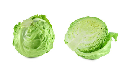 Wet young fresh cabbage whole and halved isolated on white background