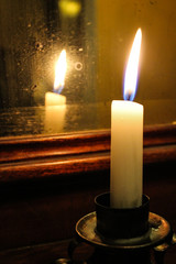 Vintage close up moody light candle