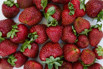 Fresh strawberries on the white background. Horizontal photo