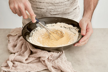 Man making a sponge cake