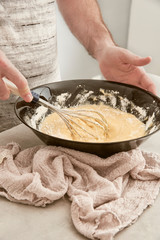 Man making a sponge cake