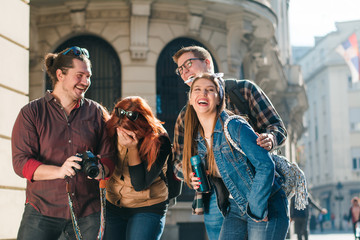 Group of tourists sightseeing the city