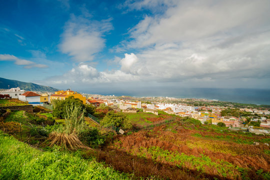 Village in Tenerife on the atlantic ocean with clouds and blue sky