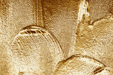 Golden painted wall texture background. Abstract texture backdrop.