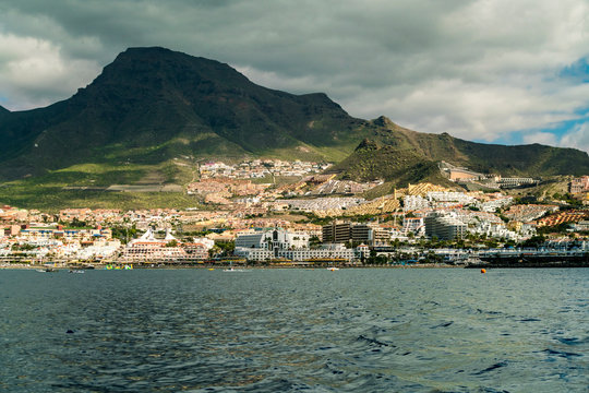 Tourist resorts at Costa los Gigantes seen from a boat in the atlantic