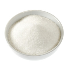 White ceramic bowl with sugar on white background