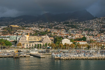 Fototapeta premium Funchal bay and Avenida do Mar with the buildings of the Marina Shopping and Baltazar Dias Theatre in Madeira, Portugal
