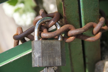 Closed strong metallic padlock garden portal	