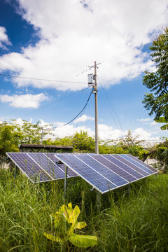 Solar panels feed energy to the power grid.