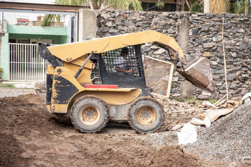 Excavator machine working on during a construction.