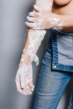 Artist Brushes Off Silicone And Plaster Molding From A Body Cast