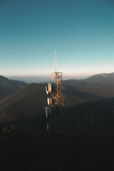 telecommunication tower on a hill