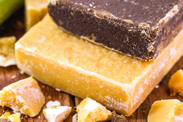 sugar cane sweets, molasses in tablets, on wooden background. consumed in Latin America, in countries like Colombia, Venezuela, Mexico, Ecuador and Guatemala.