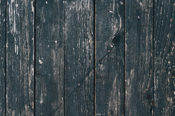Black textured background with painted cracked wood