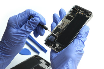 Technician repairing the Cell phone parts and tools for recovery repair smartphone and upgrade...
