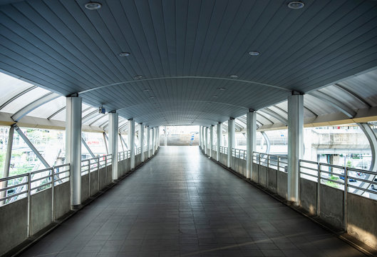 empty pedestrian bridge at Chong Nonsi Station in Bangkok's CBD area