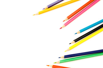 Color pencils on a white background in a row, creativity concept.