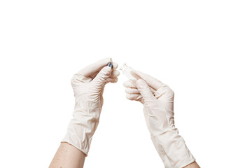 hands in sterile medical gloves hold a glass bottle and rubber cap for medicines, medical objects isolated on a white background with copy space.