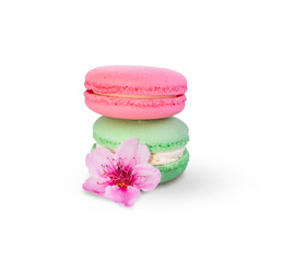 Macaroons isolated on a white background with spring flower
