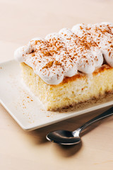 Tres leches cake, typical Latin American dessert, is made of condensed milk, evaporated milk and milk cream