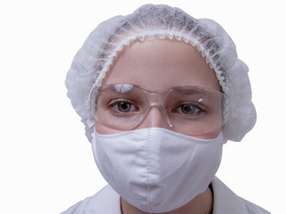 girl in a dressing gown and mask of self-isolation