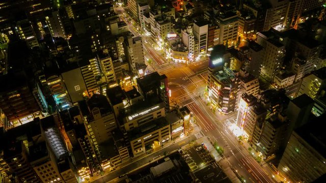 Timelapse of Tokyo streets from above, at night