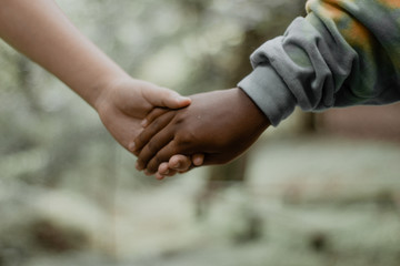 close up of hands holding each other