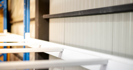 The metal rack prepare to assembling  in warehouse or storage and shelves for put cardboard boxes of products.